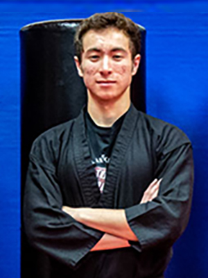 Total Impact Martial Arts - About - Sensei Allen Khomutov - Serving Arlington Heights & Buffalo Grove